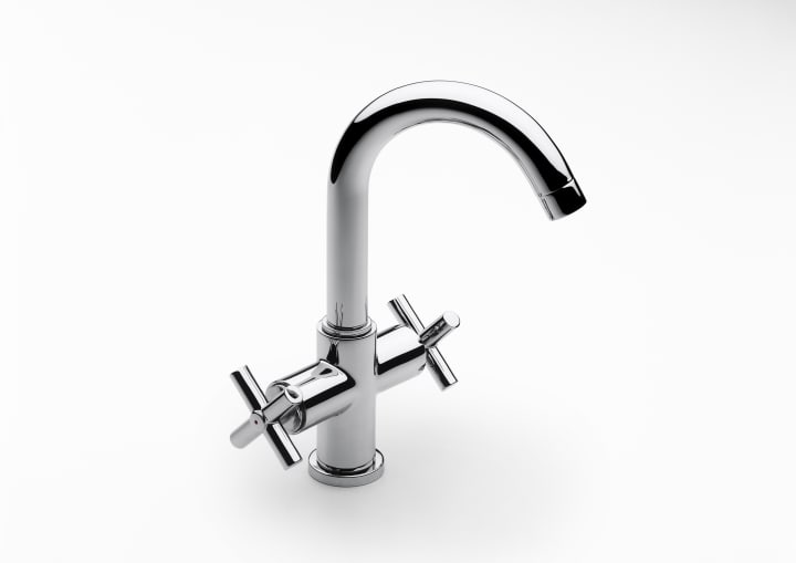 Basin mixer with pop-up waste