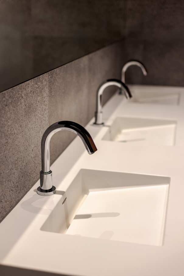 Sustainability is central to The Bridge's identity. Certified BREEAM Excellent, WELL Gold, WELL Health Safety, SmartScore and WiredScore — the first commercial property in Central and Eastern Europe to achieve the latter two. Roca delivered bathroom solutions that adhered to the high-standards of sustainability and echo the building's architectural character. Shared spaces feature water-saving L-30 Electronic faucets with Access wall-hung basins, toilets and grab bars, and client office bathrooms include L-20 Electronic faucets. Refined and timeless, the bathrooms are built for longevity — making Roca the ideal partner for this unique blend of heritage and contemporary design.2