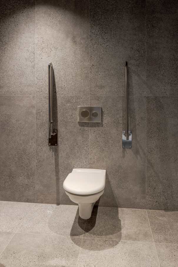 Sustainability is central to The Bridge's identity. Certified BREEAM Excellent, WELL Gold, WELL Health Safety, SmartScore and WiredScore — the first commercial property in Central and Eastern Europe to achieve the latter two. Roca delivered bathroom solutions that adhered to the high-standards of sustainability and echo the building's architectural character. Shared spaces feature water-saving L-30 Electronic faucets with Access wall-hung basins, toilets and grab bars, and client office bathrooms include L-20 Electronic faucets. Refined and timeless, the bathrooms are built for longevity — making Roca the ideal partner for this unique blend of heritage and contemporary design.4