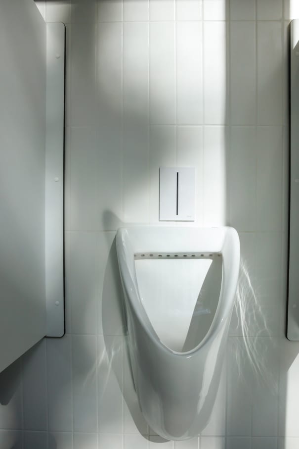 The interior design of TriQube's bathrooms embraces a serene, minimalist aesthetic, with rounded shapes and a soothing colour palette creating a calming atmosphere. Chic urinals add a touch of distinction, offering both urban flair and unique appeal, while Access grab bars and Meridian toilets ensure accessibility and comfort. Roca products were carefully selected to enhance both the functionality and innovative spirit of the space, contributing to its high standards of quality and design.6